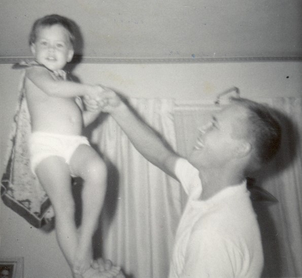 black and white photo of dad with little girl