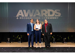 Leslie Donnelly Accepting Award at Conference