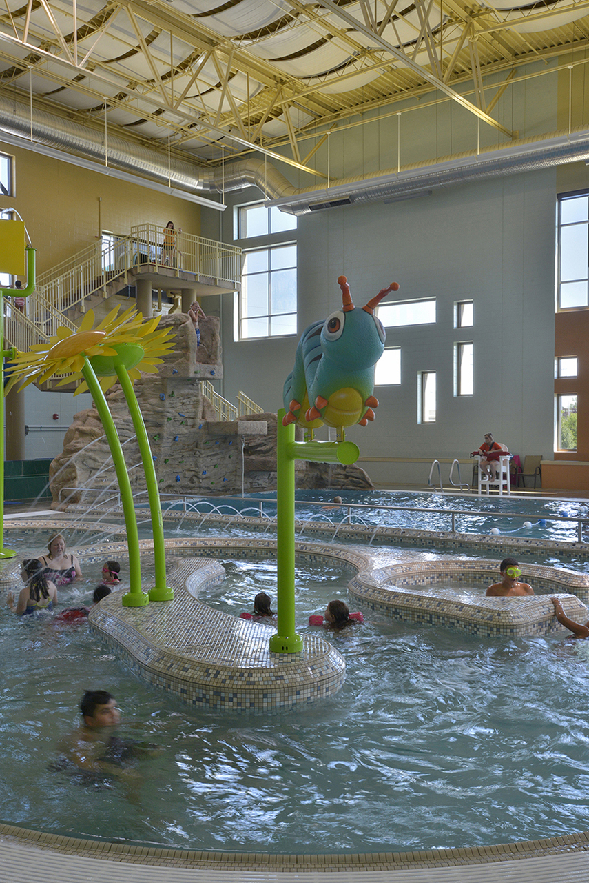 Children play in the Olathe Community Center indoor pool