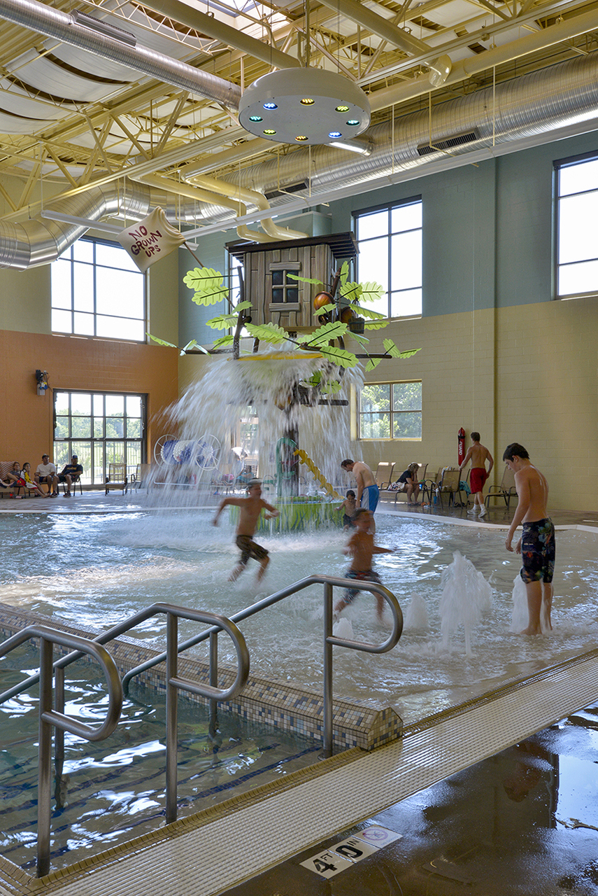 Children play in the Olathe Community Center indoor pool