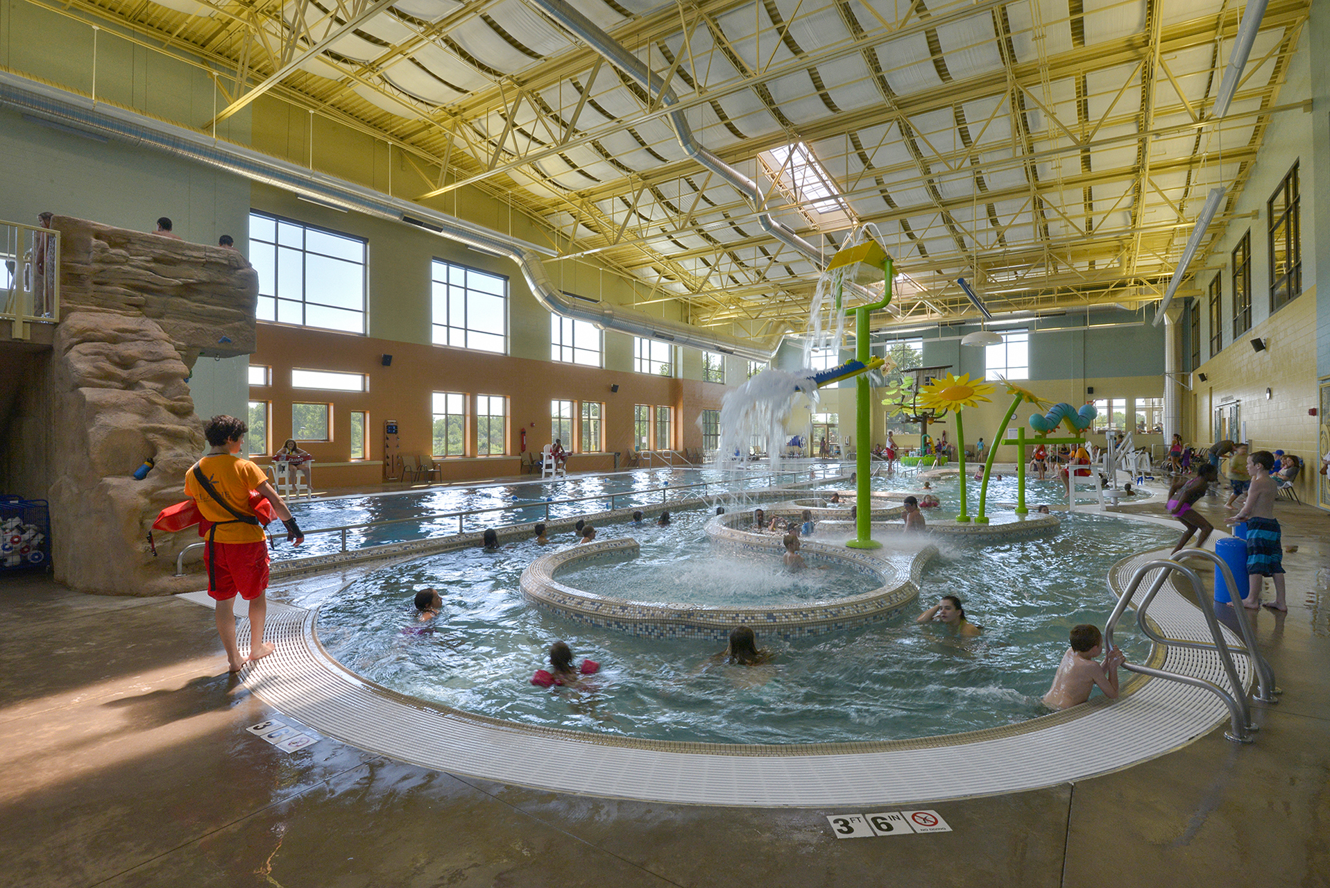 Children play in the Olathe Community Center indoor pool