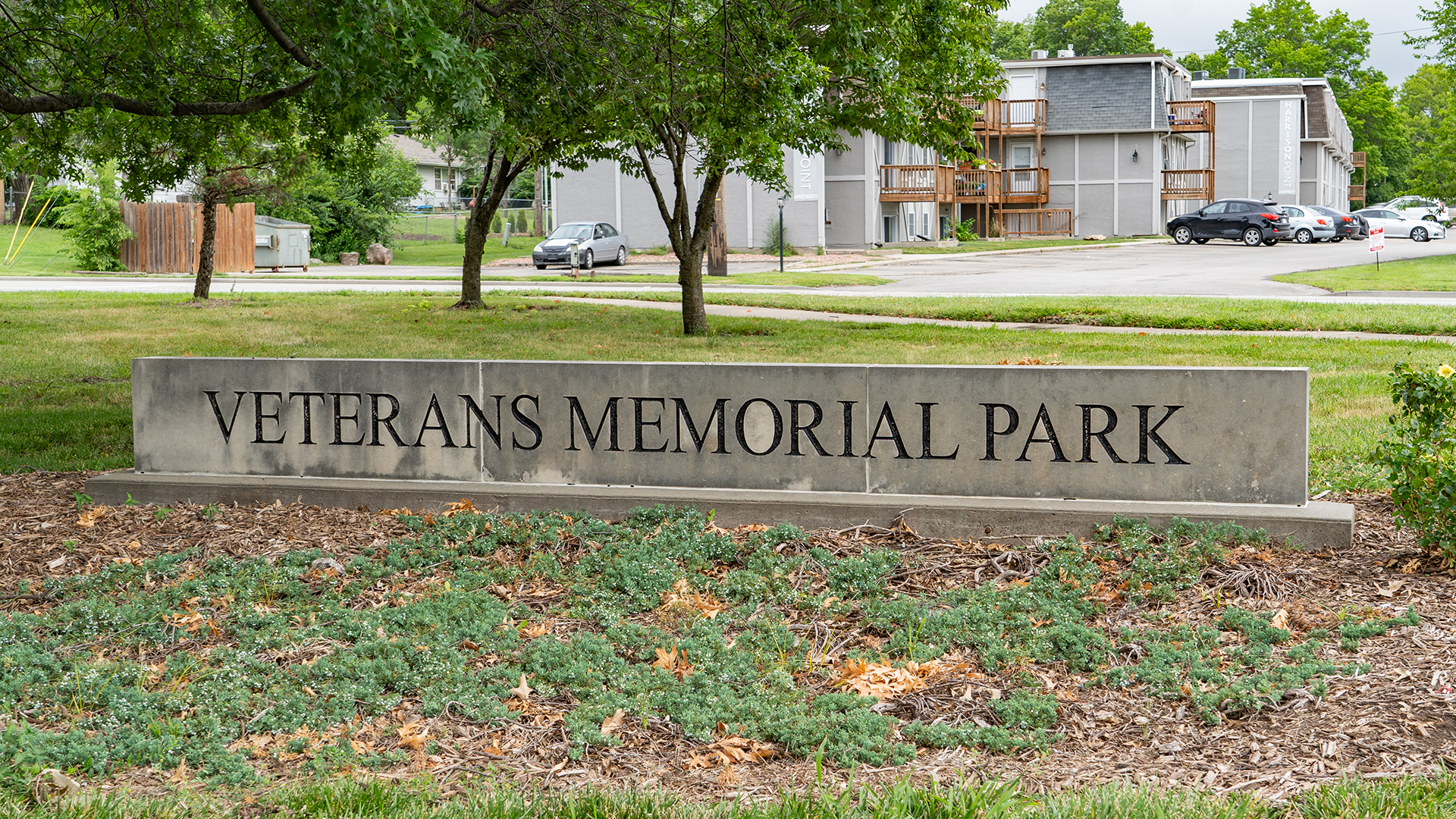 Concrete sign stating "Veterans Memorial Park"