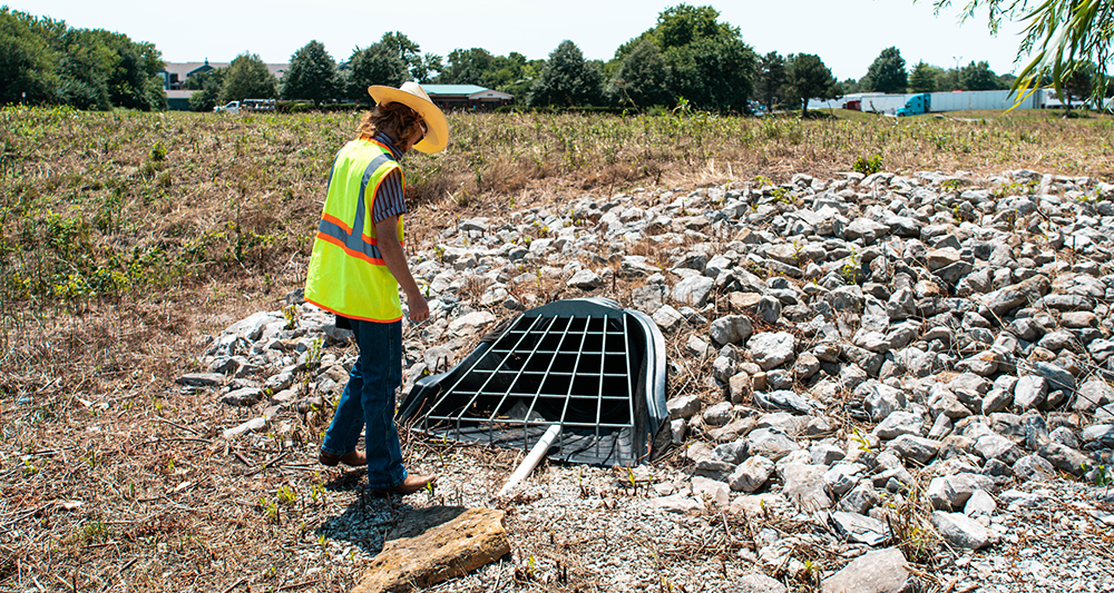 stormwater employee doing an inspection