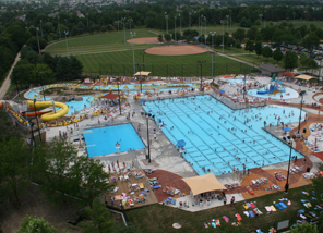 people swimming in black bob pool