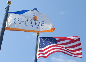 American flag and Olathe flag